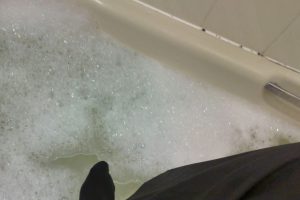 Me about to get in the bath fully clothed